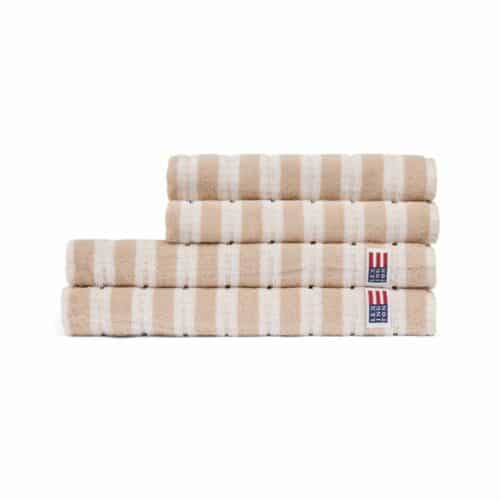 Velour jacquard handduk med lövmönster ljusbeige